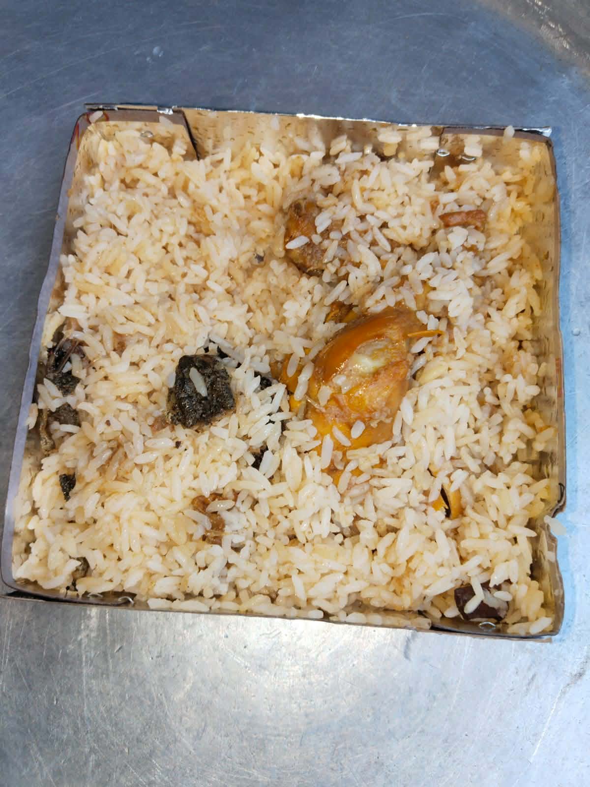 কুড়িগ্রামে মোরগ পোলাওয়ের প্যাকেটে আস্ত ব্যাঙ, ব্যবসায়ীকে জরিমানা